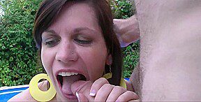 A woman, managing the home, engages in sexual activity with two large, full penises.